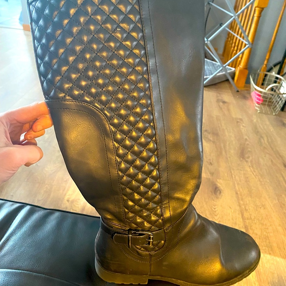 Used, in good condition black knee high wide calf moto boots